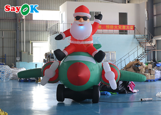 Natal inflável Santa Claus Flying Airplane Blowing do diodo emissor de luz do ancião de pano de Oxford
