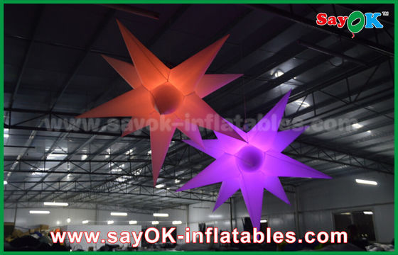 Decorações infláveis exteriores de anúncio de nylon do balão da estrela do diodo emissor de luz com o ventilador do CE/UL