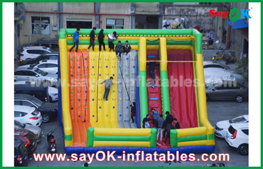Slide inflável para adultos 9.5*7.5*6.5m Slide inflável colorido com parede de escalada para parque de diversões