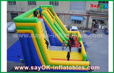 Slide inflável para adultos 9.5*7.5*6.5m Slide inflável colorido com parede de escalada para parque de diversões