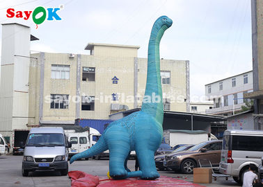 Dinossauro inflável de Natal 7m H Modelo gigante de dinossauro inflável com sopro de ar para exposição