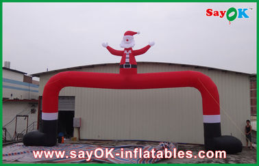 Arco inflável vermelho grande exterior do Natal do Natal com homem do Natal
